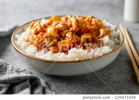 bowl of boiled rice with sweet and sour sauce bowl of boiled rice with sweet and sour sauce 120471830