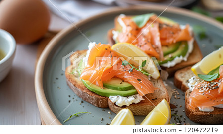 Avocado toast with smoked salmon for breakfast, homemade cuisine and traditional food, country life 120472219