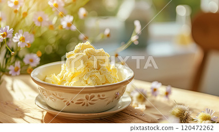 Creamy homemade butter in bowl, traditional food and country life 120472262