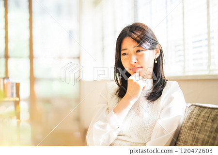 A woman thinking 120472603