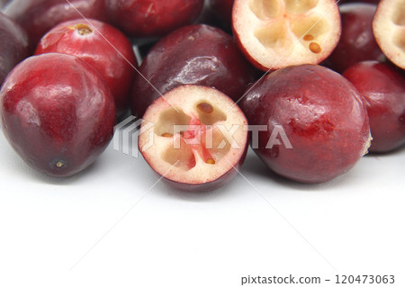 Fresh Red Cranberries With Cross-Sectional View On White Background Fresh Red Cranberries With Cross-Sectional View On White Background 120473063