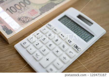 Calculator and money Calculator and money 120473167
