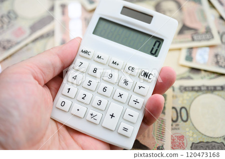 Calculator and money 120473168