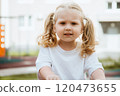 A Playful Child Happily Enjoying Various Outdoor 120473655