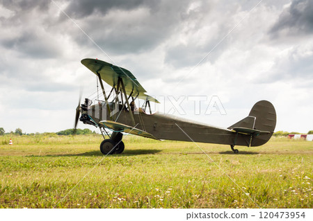 Retro airplane is preparing to take off 120473954