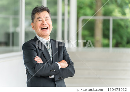 Senior generation Asian businessman in a suit (active senior, laughing, smiling, second career) 120475912