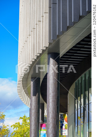 Contemporary architectural details — façade design that combines curves and straight lines Contemporary architectural details — façade design that combines curves and straight lines 120476162
