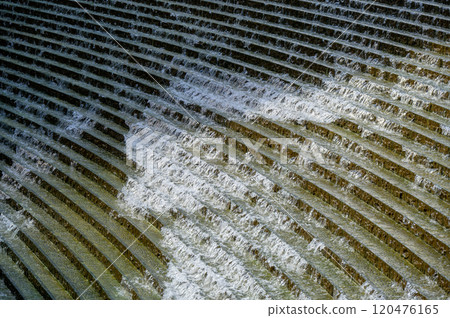 Step-like waterfalls — the delicate patterns of manmade waterfalls and natural flows Step-like waterfalls — the delicate patterns of manmade waterfalls and natural flows 120476165
