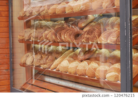 A Beautiful Array of Freshly Baked Breads Displayed Temptingly in a Bakery Window 120476215