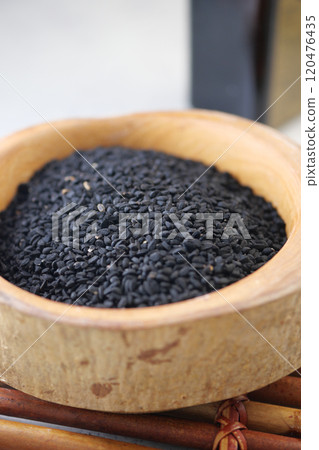 Black Cumin seed in a bowl on table Black Cumin seed in a bowl on table 120476435