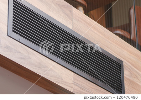 A Modern Sleek HVAC Ventilation System Seamlessly Integrated into a Beautiful Wooden Wall Design A Modern Sleek HVAC Ventilation System Seamlessly Integrated into a Beautiful Wooden Wall Design 120476480