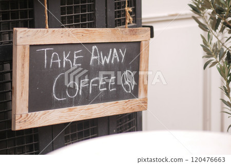 Chalkboard Sign for Takeaway Coffee in Cozy Caf Setting Chalkboard Sign for Takeaway Coffee in Cozy Caf Setting 120476663