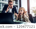 shocked father and daughter in formal wear looking at laptop in office. Selective Focus 120477121