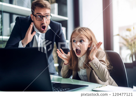 shocked father and daughter in formal wear looking at laptop in office. Selective Focus shocked father and daughter in formal wear looking at laptop in office. Selective Focus 120477121