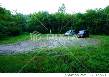 Parking lot at the trailhead of Minamimatazawa junction in the Asahi mountain range 120477221