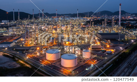 Oil and gas refinery industrial storage tank with oil and gas refinery plant at night, Refinery oil and gas power energy industrial, Oil and gas refinery petrochemical product plant pipeline steel. 120477549