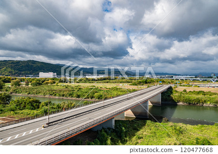 View of the Yodogawa Miyuki Bridge over the Uji River from the Sakura Deaikan Observatory, Yawata City, Kyoto Prefecture 120477668