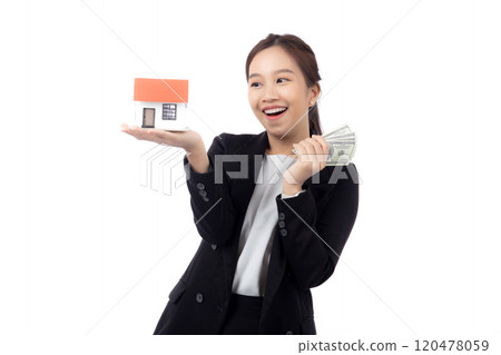 Portrait young asian businesswoman holding house and money for mortgage isolated. 120478059