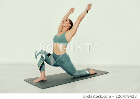 Fitness Trainer in Low Lunge Stretch Pose. 120479428