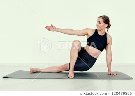 Seated Twist with Extended Arm Seated Twist with Extended Arm 120479596