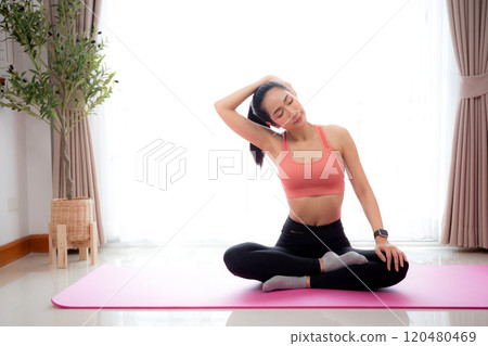 Beautiful young asian woman sitting workout with warmup and stretch muscle neck. Beautiful young asian woman sitting workout with warmup and stretch muscle neck. 120480469