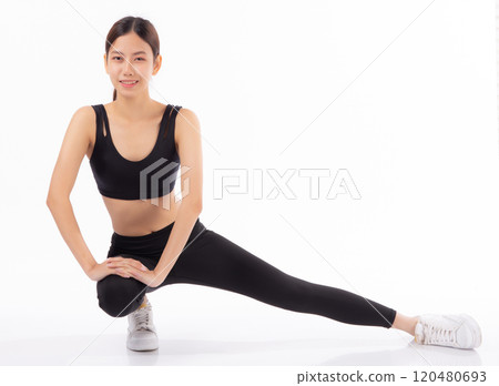 Portrait young asian woman in sportswear stretching muscle leg for health isolated white background. 120480693