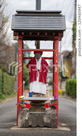 Koyama Jizo statue blocking the road 120480947