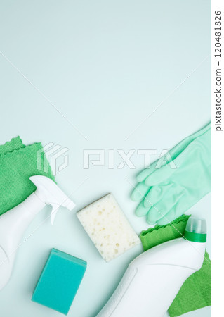 Cleaning supplies and tools, including bottles, gloves, sponges, and cloths. Concept of cleanliness and hygiene 120481826