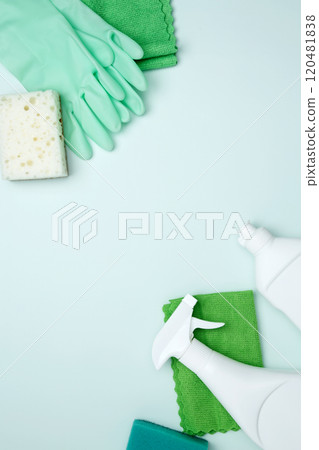 Cleaning supplies and tools, including bottles, gloves, sponges, and cloths. Concept of cleanliness and hygiene 120481838