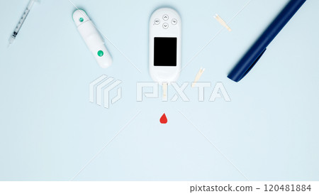 Diabetes concept with glucometer, syringe pen with insulin, blood test strips. Concept of worldwide diabetes awareness. Top view. Copy space Diabetes concept with glucometer, syringe pen with insulin, blood test strips. Concept of worldwide diabetes awareness. Top view. Copy space 120481884
