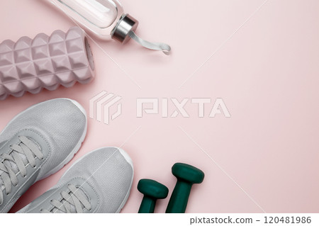Healthy lifestyle, athlete's equipment set dumbbells, foam roller for Myofascial release Healthy lifestyle, athlete's equipment set dumbbells, foam roller for Myofascial release 120481986