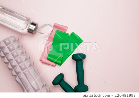 Healthy lifestyle, athlete's equipment set dumbbells, resistance band, foam roller for Myofascial release Healthy lifestyle, athlete's equipment set dumbbells, resistance band, foam roller for Myofascial release 120481992