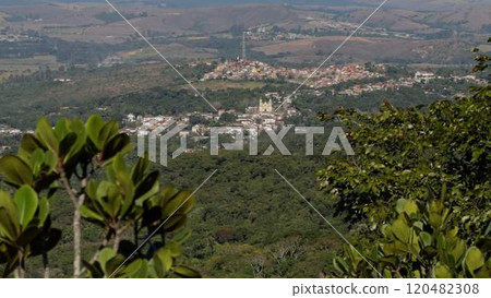 Slow motion view of Tiradentes with church atop colonial houses 120482308