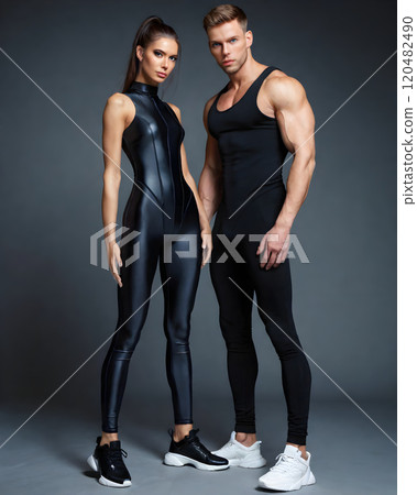 A pair of a beautiful woman and a muscular man A pair of a beautiful woman and a muscular man 120482490