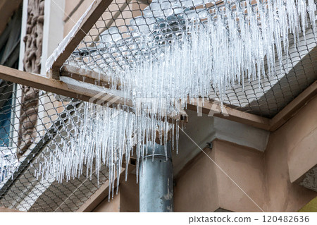 icicles on the office building icicles on the office building 120482636