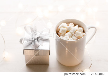 Cups of delicious hot chocolate and artisanal gift box 120483066