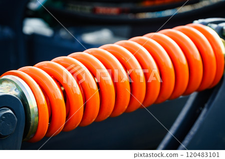 Industrial spring at agricultural machine Industrial spring at agricultural machine 120483101