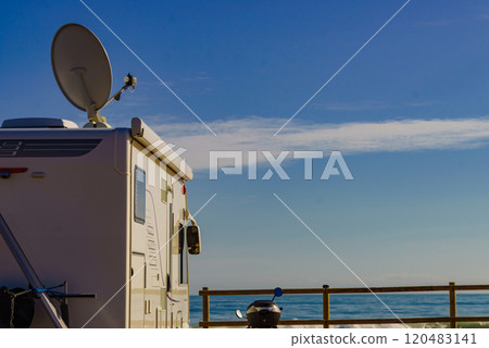 Satellite dish on roof of caravan Satellite dish on roof of caravan 120483141