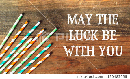 Bunch of straws with a message that says May the luck be with you 120483966