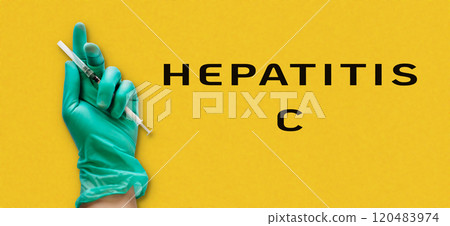 Person holding a syringe with the word Hepatitis C written below 120483974