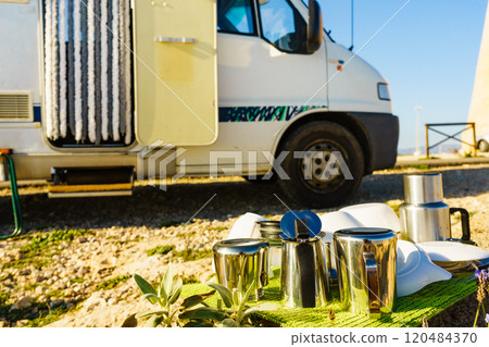 Clean dishes drying on fresh air, capming outdoor 120484370