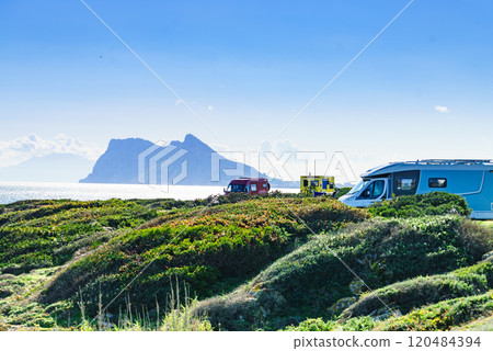 Caravans on spanish coast, Gibraltar rock on horizon 120484394