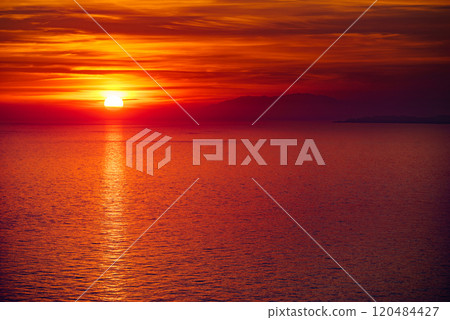 Sunset over sea 120484427