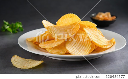 AI image: Potato chips on a plate 120484577