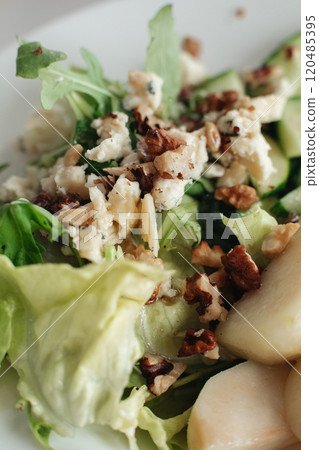 Salad with blue cheese, pears, nuts, chard and 120485395