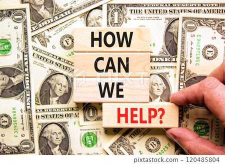 How can we help symbol. Concept words How can we help on beautiful wooden blocks. Dollar bills. Businessman hand. Beautiful background from dollar bills. Business how can we help concept. Copy space. 120485804