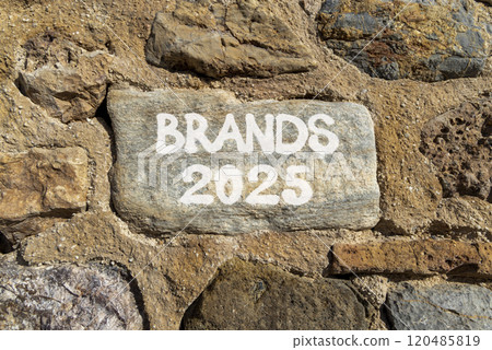 Planning brands 2025 new year symbol. Concept words Brands 2025 on beautiful grey stone. Beautiful big stone wall background. Business brands 2025 new year concept. Copy space. Planning brands 2025 new year symbol. Concept words Brands 2025 on beautiful grey stone. Beautiful big stone wall background. Business brands 2025 new year concept. Copy space. 120485819