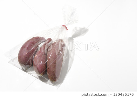 Bagged sweet potatoes photographed on a white background Bagged sweet potatoes photographed on a white background 120486176