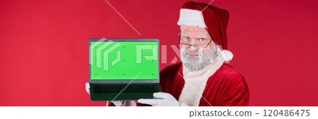 Santa Claus Showing Laptop with Green Screen Background Santa Claus Showing Laptop with Green Screen Background 120486475