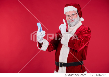 Santa Claus Taking Selfie with Smartphone on Red Background 120486706